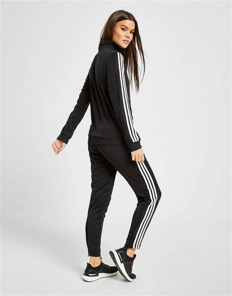koop zwart adidas  stripes tiro tracksuit dames jd sports