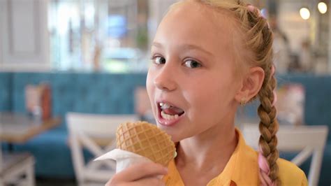 adorable person enjoying ice cream cone with stock footage sbv