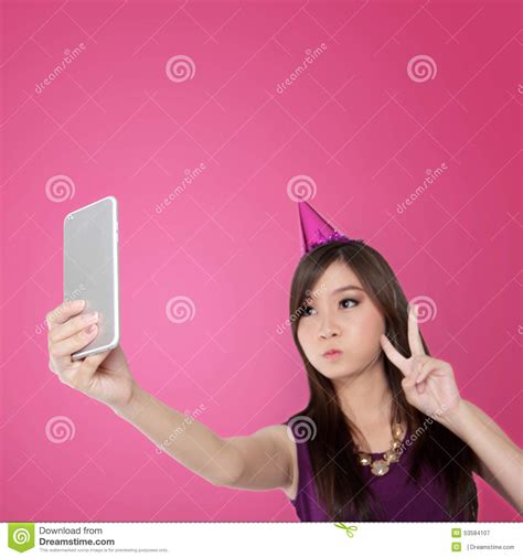 Sweet Asian Teen Doing A Cute Selfie Pose Stock Image