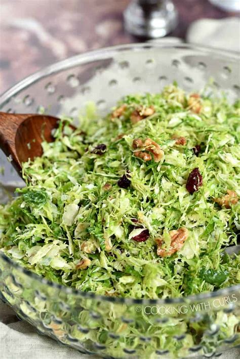 shaved brussels sprouts salad cooking with curls