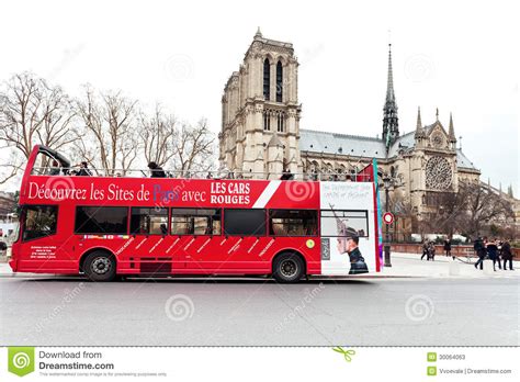 red sightseeing bus  paris notre dame editorial stock photo image  scenery sightseeing