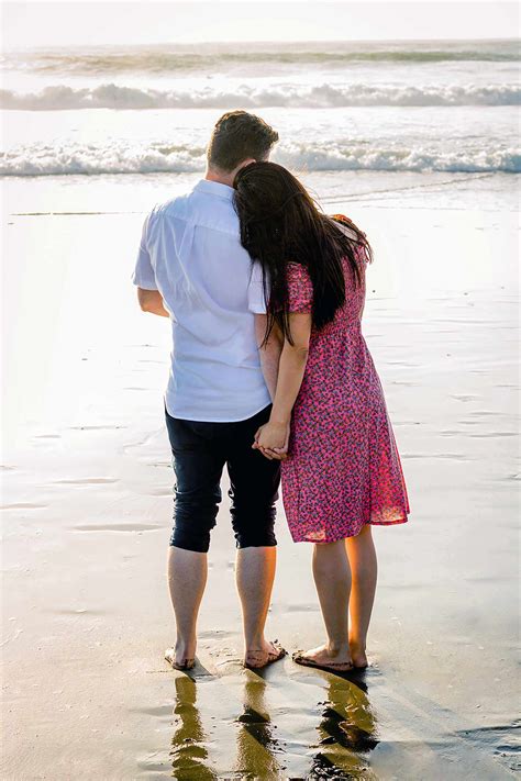 couple a walk on the beach ana comsa photography