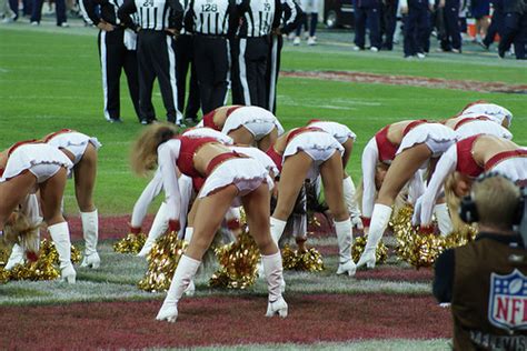 21 cheerleaders showing off more than just their pom poms