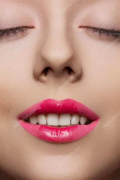 model with fashion pink lips make up clean skin close up