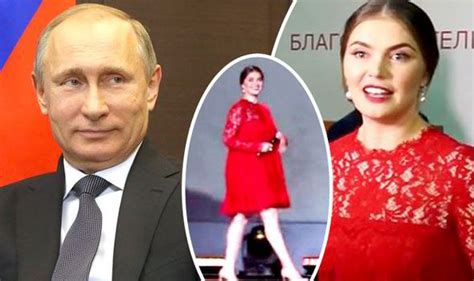 Was Alina Kabaeva Putin’s Mystery Lady In Red