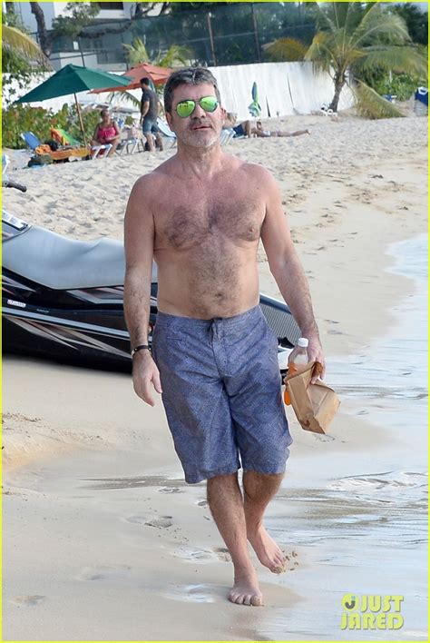 photo simon cowell goes shirtless at the beach with longtime love