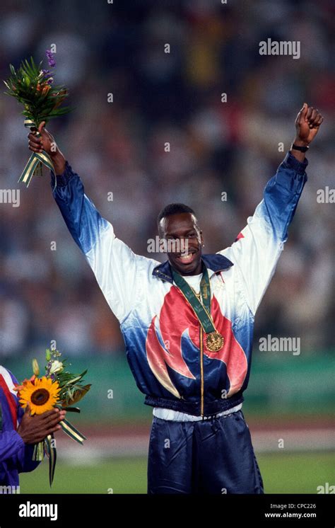 Michael Johnson On The Podium After Receiving His Gold Medal For The