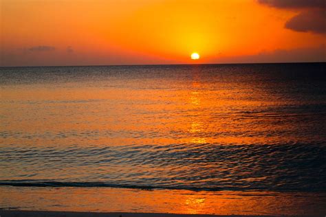 sunsets   mile beach grand cayman cayman islands