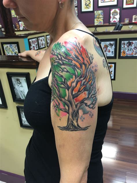 woman   tree tattoo   arm