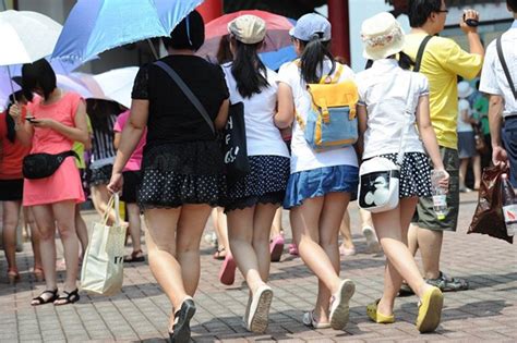 Chinese Girls Line Up For The Miniskirt Discount At A