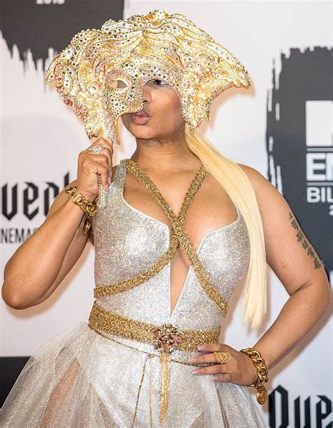 Nicki Minaj Shows Off Her Unedited Curves With A Gold Crystal