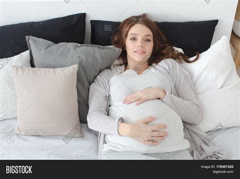 pregnant female lying image and photo free trial bigstock
