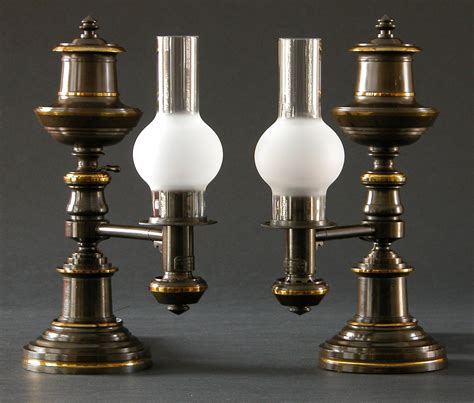 pair  classical argand lamps charles clark