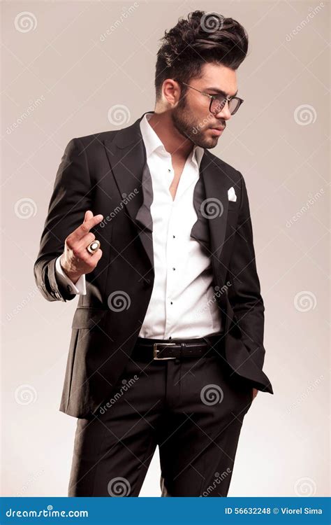 attractive young business man snapping  fingers stock photo image