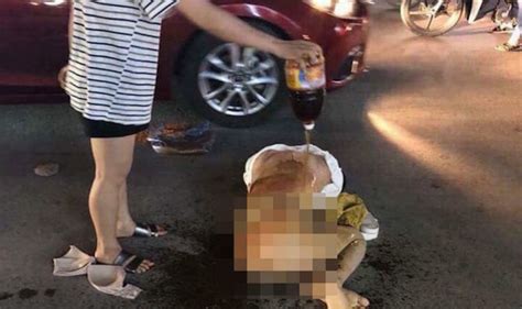 vietnam news wife strips husband s mistress and burns her with chilli powder world news