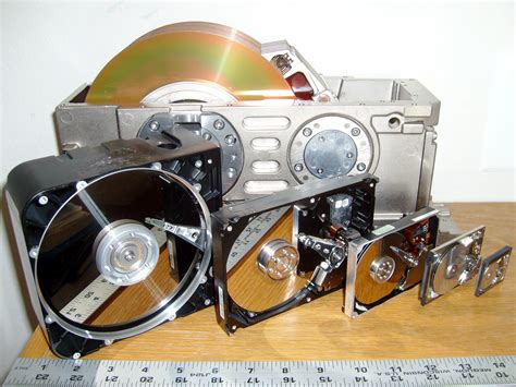 describe   hard disk   computer works   advancements  disk drive