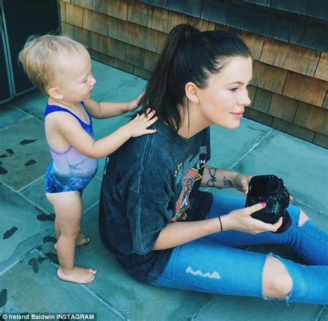 ireland baldwin shows off her sexy figure as she strips to bikini for candid photos daily mail