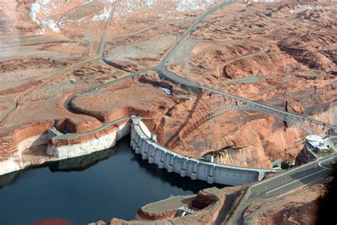 aerial view of glen canyon dam with navajo generating station in the