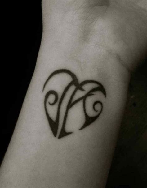 stylish wrist initials tattoos