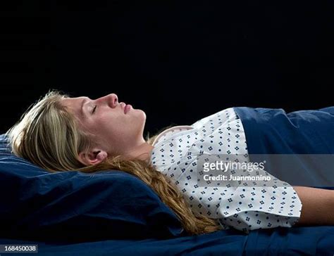 passed out on bed photos and premium high res pictures getty images