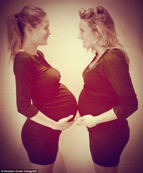 doutzen kroes cradles her bump in tight black dress as she poses with