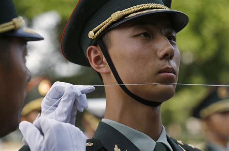 chinese military relaxes rules   shorter  portly soldiers