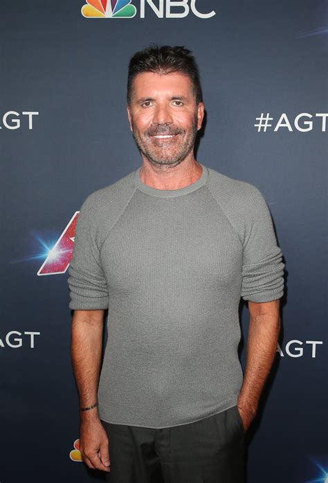 simon cowell unrecognisable   appears   lost  weight