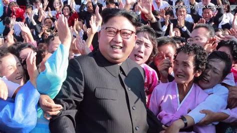 why are so many north koreans crying in pictures with kim jong un