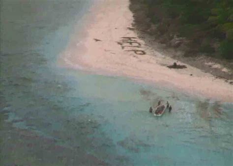 three men rescued from remote island after writing help on the sand chicago tribune