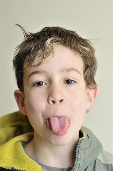 boy pokes  tongue  photograph  matthias hauser pixels
