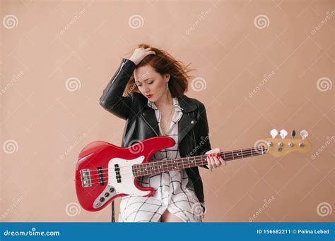 Young Beautiful Woman Posing With Red Bass Guitar Stock Image Image