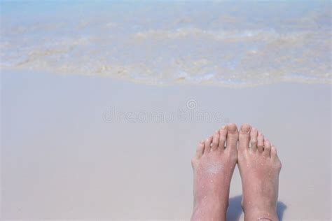 close up of female feet on white sandy beach stock image image of