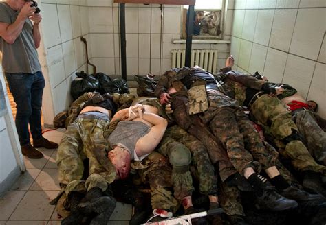 Donetsk Ukraine — Dozens Of Dead Insurgents Lay Piled In A Van