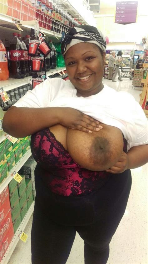 black bbw flashing her big tit in the store flashing in stores