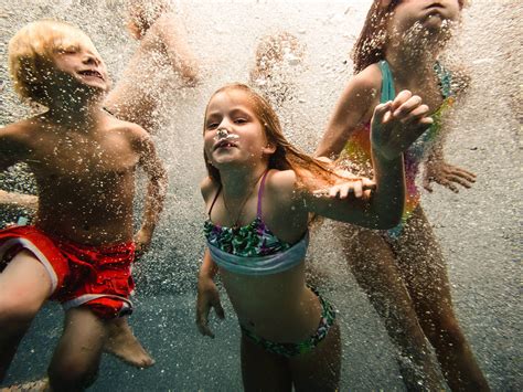 photo  kids swimming underwater  samantha mcbride click magazine