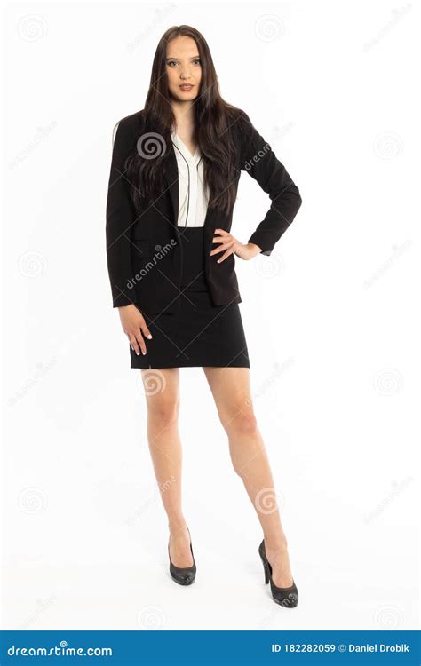 A Businesswoman Is Standing In A Black Classic Suit And Rests Her Hand