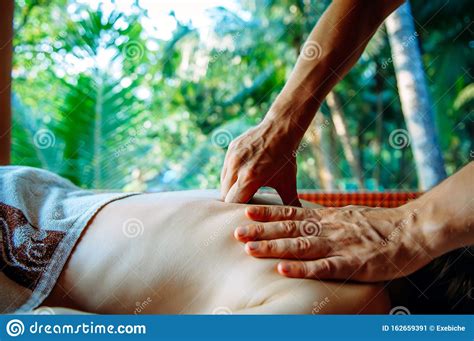 acupressure massage in spa centre outdoor woman at