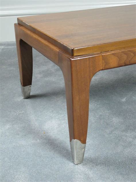 long low saber leg coffee table for sale at 1stdibs