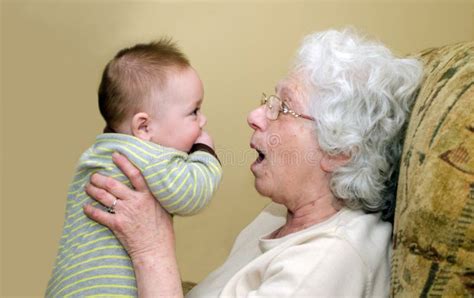grandma playing   baby stock image image  horizontal