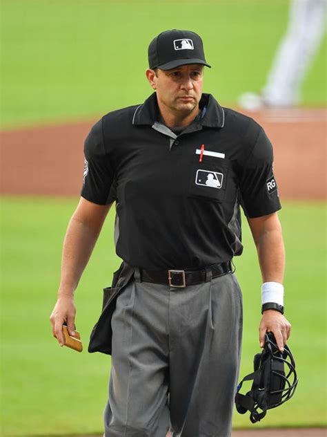 mlb umpires wear wristbands to protest abusive treatment