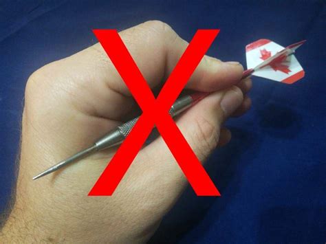 hold  dart  basics  proper dart grip