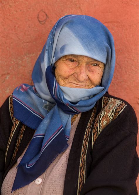 people elderly turkish woman in blue scarf smiling john greengo john