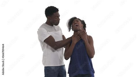 Portrait Of Young Black Couple Aggressive Young Man Putting Hands Near