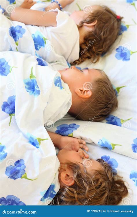 children   sleeping  bed royalty  stock image image