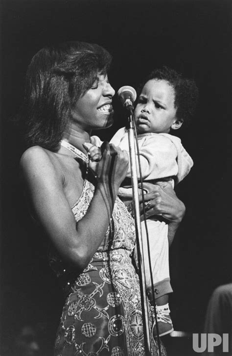 photo natalie cole introduces 10 month old son robert adam yancey to
