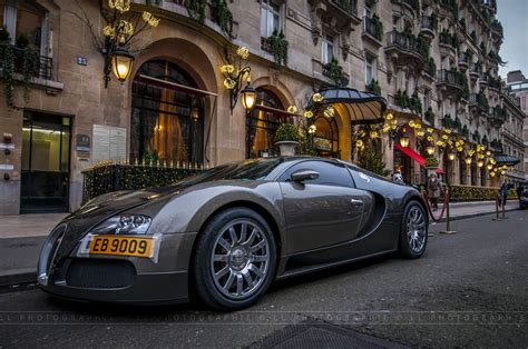 bugatti car parked   street  front   building