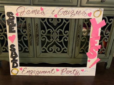 sign   games  couples engagement party   side   dresser  pink hearts