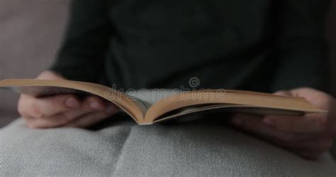 man hand turning pages   book close  unrecognizable person hand