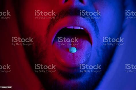 Close Up Of Man Mouth Swallowing Ecstasy Drugs Man Taking Mdma Ecstasy