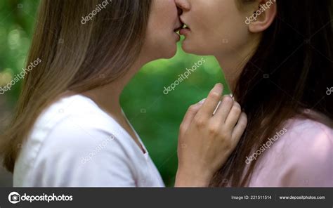 affectionate kiss two attractive lesbians first love